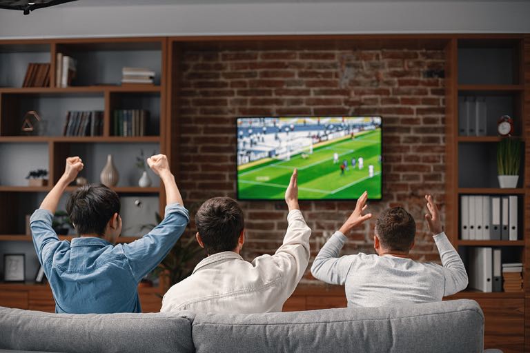 People watching football on TV